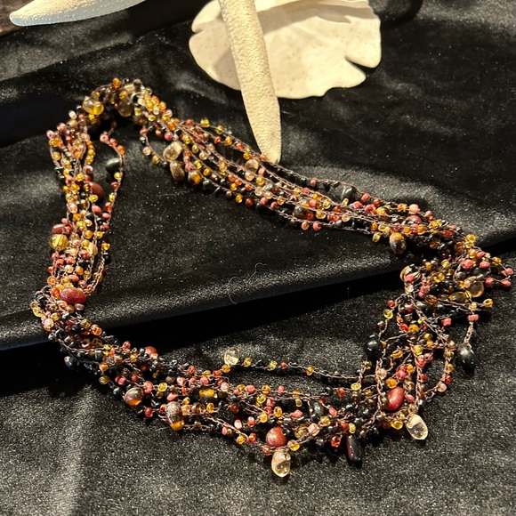 Multi strand necklace made with small glass beads - Picture 3 of 4